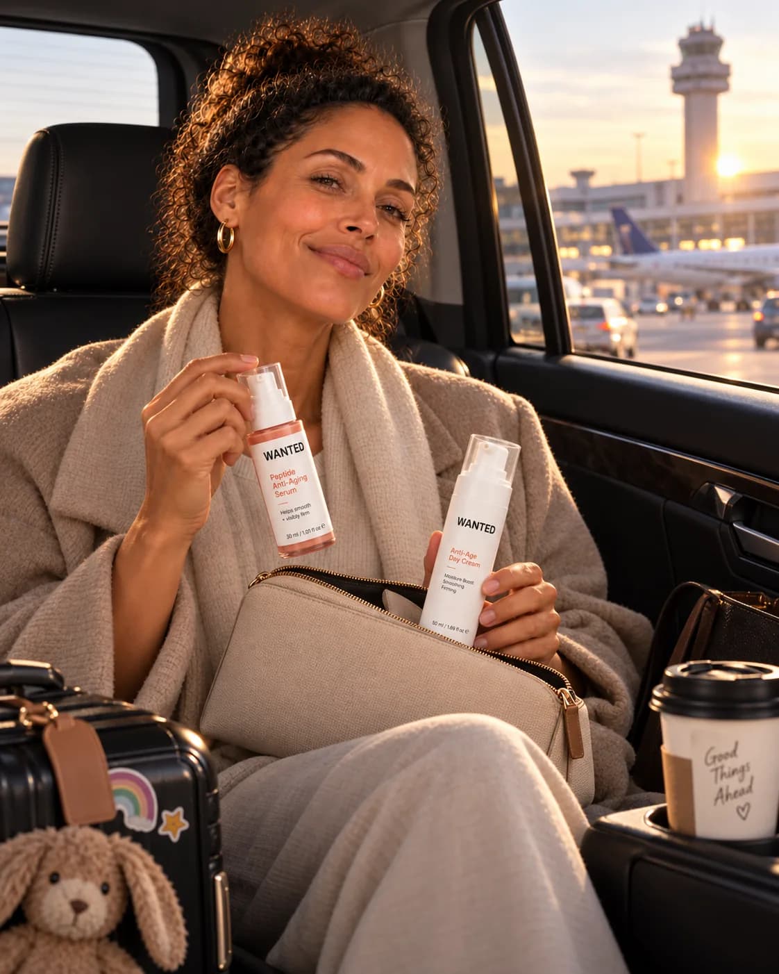 Hanna in the back of a car at sunrise on the way to the airport, serum in hand