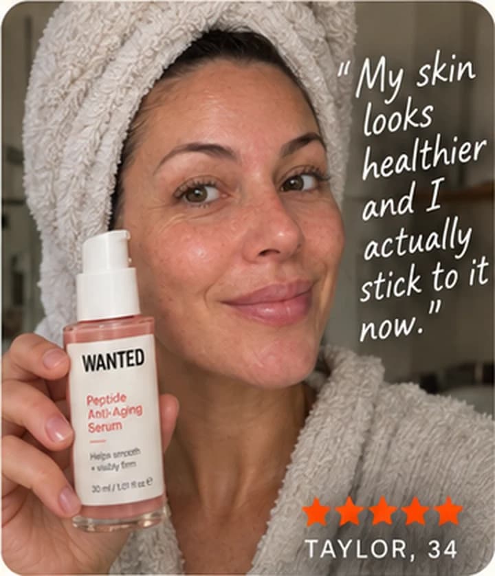 Taylor, 34, hair in a towel after a shower, holding the WANTED Peptide Anti-Aging Serum.
